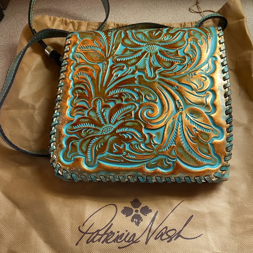 PATRICIA NASH Tooled Leather Cassini Crossbody Bag in Turquoise and Bronze.